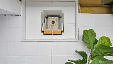 Oh my goodness - are you kidding me? It’s an ingenious little setup for safe target practice using a BB or pellet system - no firearms please! Mounted on rollers, you can pull it toward you with the string and send it back with the stick on the lower right. Simply fantastic craftsmanship and creativity!