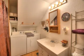 Conveniently located full size washer & dryer and tub/shower in bathroom.
