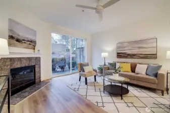 Cozy fireplace and ceiling fan keep you comfortable through every season