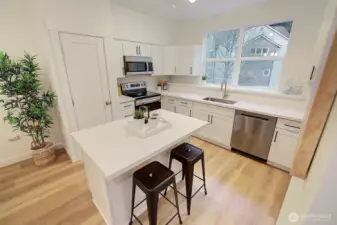 Island is great for prep or dining!