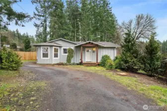 Welcome home to this charming rambler set back from the road, offering ample parking and added privacy.