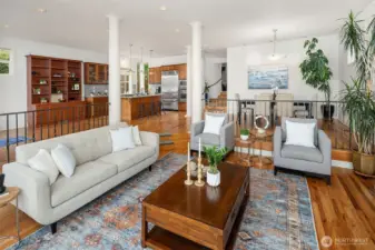 Sophisticated open-plan layout combining living, dining, and kitchen spaces with stunning lake views