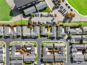 Aerial view of the community with the subject property outlined in yellow.