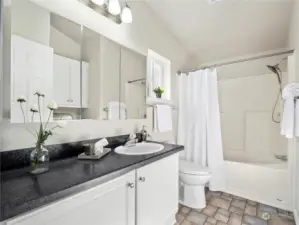 The full bathroom off the primary is bright and has plenty of storage space for you necessities.