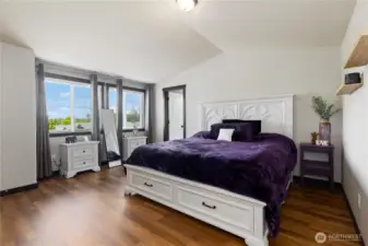 Primary bedroom with tons of natural light