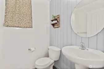 Powder room off of the kitchen