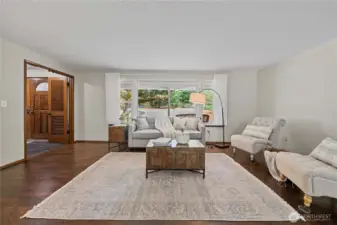 Come into the slate entry and beautifully restored hardwoods.
