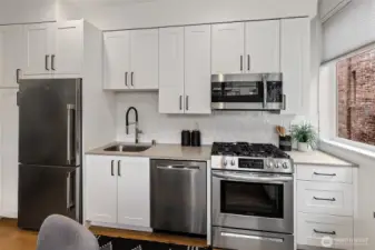 Plenty of space in the kitchen, with added cabinets and counters to increase the storage and usability.