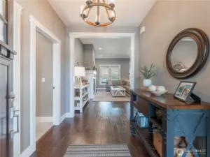 Welcoming Entryway – Bright and open entry greets you with modern finishes and natural light.