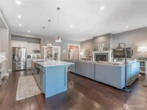 Gourmet Kitchen – Beautiful cabinetry, quartz countertops, and stainless appliances.
