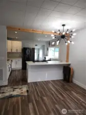 Plenty of room for a dining table and eat-in space from kitchen island.