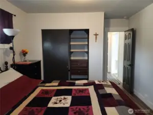 Closet with built-in units for maximum storage and use of space.