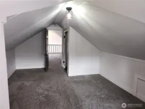 Plenty of space for a good sized bed and other furniture pieces in this bedroom.