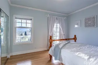 Bedroom 1 showing access to 2nd floor balcony