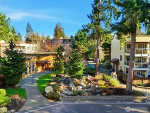 Desirable Sequoyah community featuring beautifully maintained grounds, secure lobby entry, elevator, outdoor pool, fitness room & clubhouse