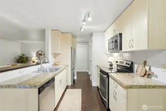 Stainless steel appliances and granite counter tops