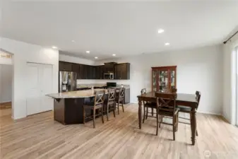 Open-concept layout connects the living room, dining area, and kitchen—perfect for modern lifestyles.