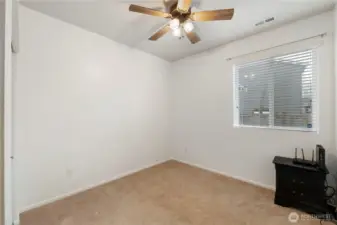 Rare and desirable main-floor bedroom offers flexibility for guests, multigenerational living, or a home office. Bedroom #1