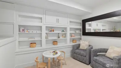 This space is currently used as a ready/toy room and could be a large walk-in closet if converted for bedroom use.