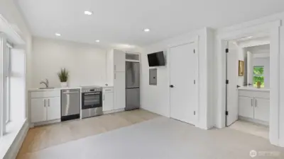 Guest suite with full kitchen and bath attached for extended stays.