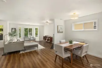 Well lit dining area and open flow living space