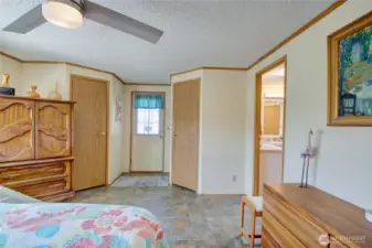 Nice sized main bedroom with beautiful vinyl flooring.