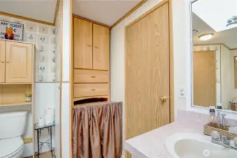 Behind the bathroom door was a stand alone shower. Pipes and drain are still there to return it to a shower.