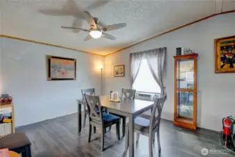 Dining area is very roomy with overhead fan/lighting.