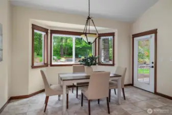 Breakfast nook off kitchen, with easy access to the covered patio.