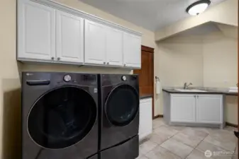 The custom floorplan shows itself off when you can walk thru the PBR closet to the nice laundry!
