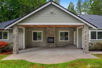 The 2 sided FP extends the use of the beautiful covered patio. Knotty pine ceiling with 2 skylights.