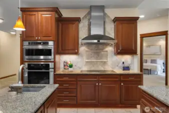 2 sinks, Wall mounted Microwave, oven, and warming drawer.