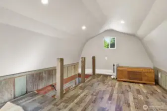 Large tiny home loft showing railing that can easily be completed.