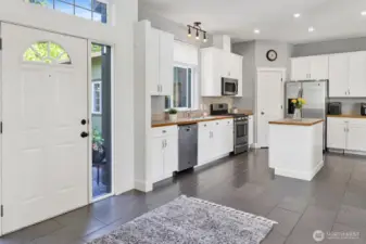 Looking back at the entrance you will notice the porcelain wood-look flooring.
