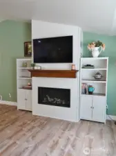 A gorgeous addition to this house....an encassed propane fireplace, which provides a focal point for the room.