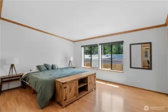 Primary bedroom is huge: plenty of space for the king-size furniture and then some.