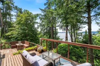 Choose your hang spot with built-in benches on the below deck and spread your furniture on the top. You'll get a great view from both sides.