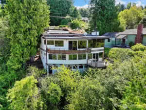 Home has plenty of greenery for year round enjoyment.