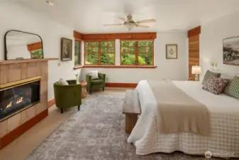 Private primary bedroom suite on upper level easily accessed by elevator