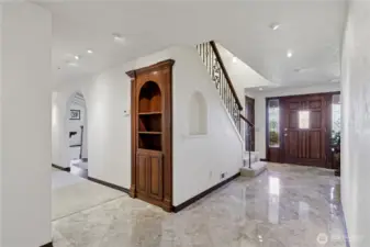Entry with dining and living rooms to the left in this view