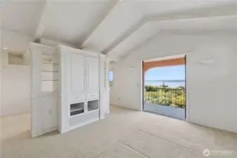 Primary suite with sweeping sound and mountain views and a private deck