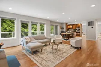 Open concept on the main floor - living room flows to dining space to kitchen to living room and you can see all the way through