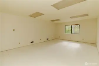 The finished space above the detached garage, just needs plumbing to be a fully functional living space!