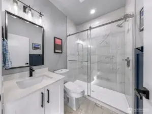 First floor full bathroom with beautiful finishes.