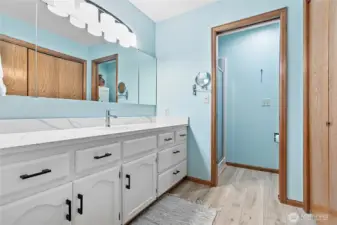 Owner En-suite attached with a large vanity, large closets & separate water closet with a shower.