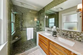 En-suite bathroom with walk-in shower, vanity and water closet.