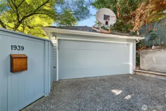 The detached one car garage in the alley.