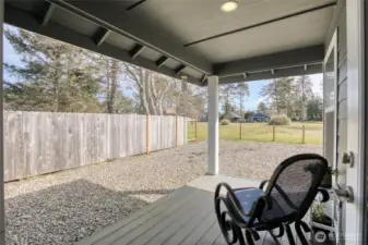Kitchen patio door exits to the covered, trex deck. Sellers will not be completing fence before closing.