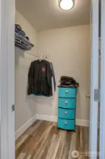Primary en-suite walk-in closet.