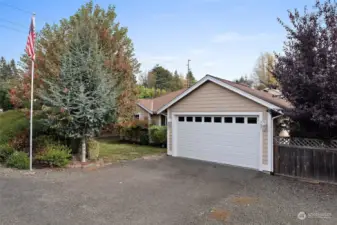 Welcome to your dream home! Be greeted by the wonderful front yard.